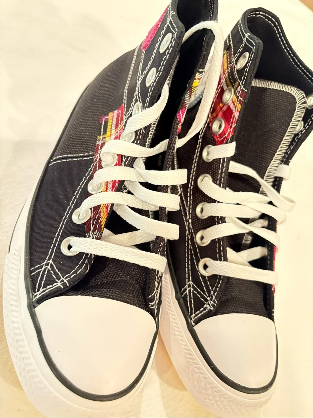 Converse Black High-Top Sneakers with Red Plaid Accent